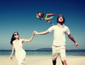 Couple Beach Kite Flying Getaway Holiday Concept Royalty Free Stock Photo