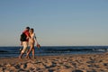Couple during a beach stroll Royalty Free Stock Photo