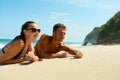 Couple On Beach In Summer. Romantic People On Sand At Resort