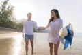 Couple On Beach Summer Vacation, Beautiful Young Happy People In Love Walking, Man Woman Smile Holding Hands Royalty Free Stock Photo