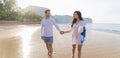 Couple On Beach Summer Vacation, Beautiful Young Happy People In Love Walking, Man Woman Smile Holding Hands Royalty Free Stock Photo