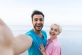 Couple On Beach Summer Vacation, Beautiful Young Happy People Taking Selfie Photo, Man Woman Embrace Sea Royalty Free Stock Photo