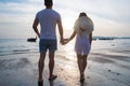 Couple Beach Summer Vacation, Man Woman Holding Hands Sunset Young Guy Girl Back Rear View Royalty Free Stock Photo