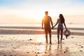 Couple On Beach At Sunset Summer Vacation, Beautiful Young People In Love Walking, Man Woman Holding Hands Royalty Free Stock Photo