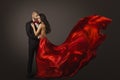 Couple Beauty Portrait, Beautiful Woman Dancing in Red Dress and Elegant Man, Fluttering Gown Royalty Free Stock Photo