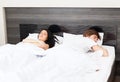 Couple at bed Royalty Free Stock Photo