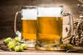 Couple of beers closeup on wooden table