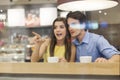 Couple behind window at cafe Royalty Free Stock Photo