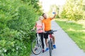 Couple with bicycle and smartphone taking selfie Royalty Free Stock Photo