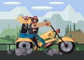 Couple biker riding powerful motorcycle along highway against background of mountain and forest landscape Royalty Free Stock Photo