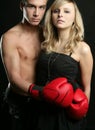 Couple of blond girl and handsome boxer man Royalty Free Stock Photo