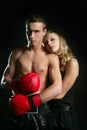Couple of blond girl and handsome boxer man Royalty Free Stock Photo