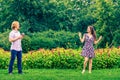 Couple blowing bubbles outdoor Royalty Free Stock Photo