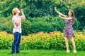 Couple blowing bubbles outdoor Royalty Free Stock Photo