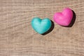 Couple of blue and red heart shapes over wooden table. Valentine Royalty Free Stock Photo