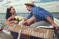 Couple in a boat outdoors Royalty Free Stock Photo