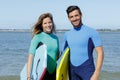 couple bodyboarders looking at camera Royalty Free Stock Photo