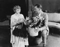 Couple with bouquet of roses Royalty Free Stock Photo