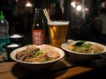 A couple of bowls of food on a table. AI generative image . Japanese street food.