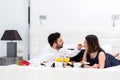 Couple at breakfast in hotel room. Royalty Free Stock Photo