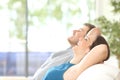 Couple breathing and resting at home Royalty Free Stock Photo