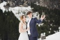 The couple, the bride and groom making a selfie in the mountains Royalty Free Stock Photo