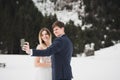 The couple, the bride and groom making a selfie in the mountains Royalty Free Stock Photo