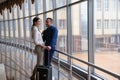 Couple at the bright airport waiting aircraft Royalty Free Stock Photo