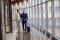 Couple at the bright airport waiting aircraft Royalty Free Stock Photo