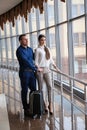 Couple at the bright airport waiting aircraft Royalty Free Stock Photo