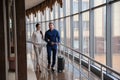 Couple at the bright airport waiting aircraft Royalty Free Stock Photo