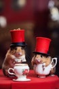 A couple of British hamsters fearing top hats and drinking a tea. AI generative image.