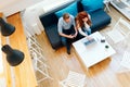 Couple browsing web together in living room Royalty Free Stock Photo