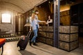 Couple on a business trip doing check-in at the hotel. Young couple near reception desk in hotel Royalty Free Stock Photo