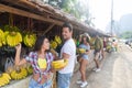 Couple Buying Bananas On Street Traditional Market, Young Man And Woman Travelers Royalty Free Stock Photo