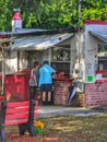 A couple buying barbeque in Dunedin