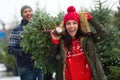 Couple buying Christmas tree Royalty Free Stock Photo
