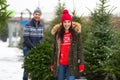 Couple buying Christmas tree Royalty Free Stock Photo