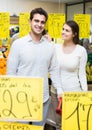 Couple buying fresh seasonal fruits in market Royalty Free Stock Photo