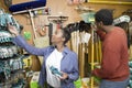 Couple Buying Gardening Equipment