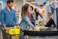 Couple buying goods in a grocery store Royalty Free Stock Photo