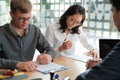 Couple buying renting house car signing mortgage insurance purchase order contract agreement with realtor real estate agent Royalty Free Stock Photo