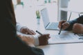 Couple buying renting house signing mortgage contract agreement with realtor real estate agent Royalty Free Stock Photo