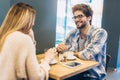 Couple in cafe enjoying the time spending with each other Royalty Free Stock Photo