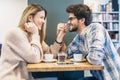 Couple in cafe enjoying the time spending with each other Royalty Free Stock Photo