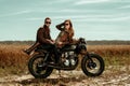 Couple and cafe racer motorcycle Royalty Free Stock Photo