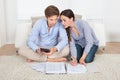 Couple calculating budget at home Royalty Free Stock Photo