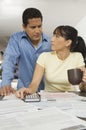 Couple Calculating Finance At Home Royalty Free Stock Photo