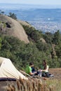 Couple Camping Above the City