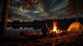 Couple camping under the stars with a cozy campfire.